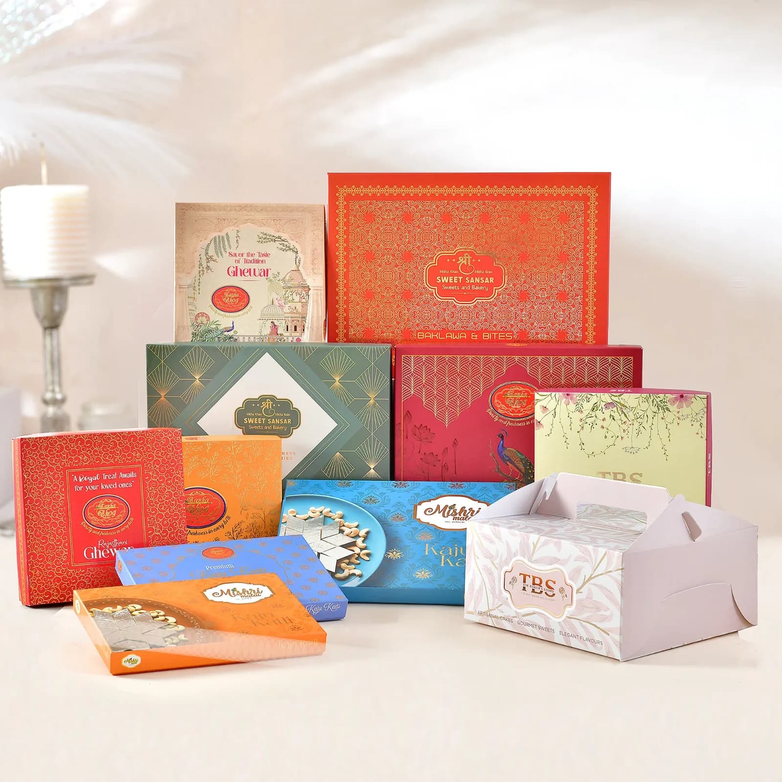 A spread of festive gifting boxes designed and printed by Sparsh for multiple Lucknow brands